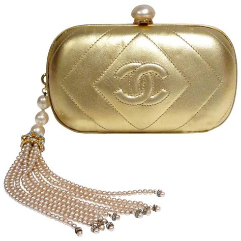 vintage chanel gold clutch|old fashioned Chanel bags.